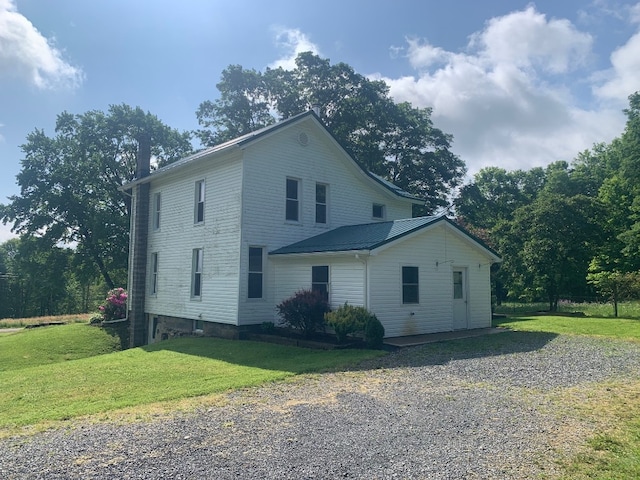 5511 Lake Rd, Atlantic, PA 16111 - view of home's exterior featuring a yard and gravel driveway