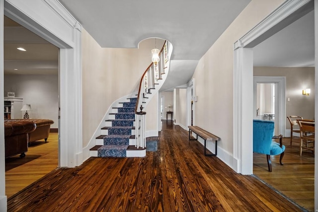 foyer with dark wood-type flooring