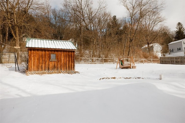 view of yard layered in snow