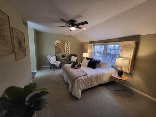 bedroom featuring carpet floors, ceiling fan, and lofted ceiling