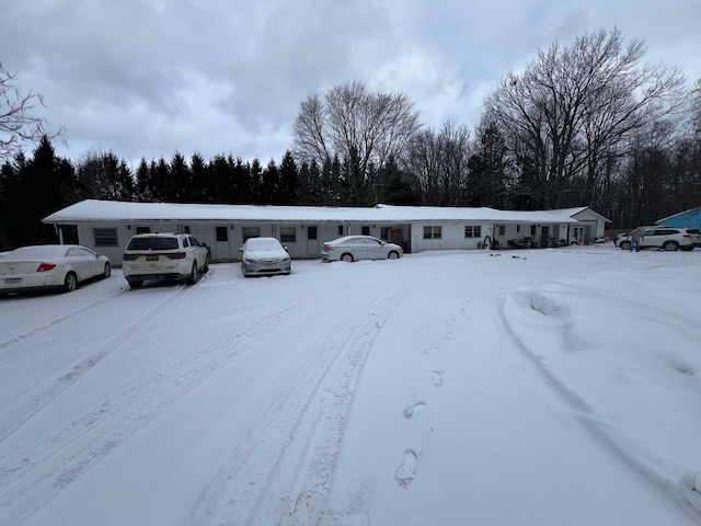 view of snow covered property