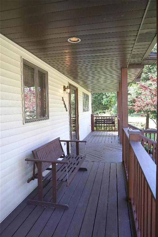 wooden terrace with covered porch