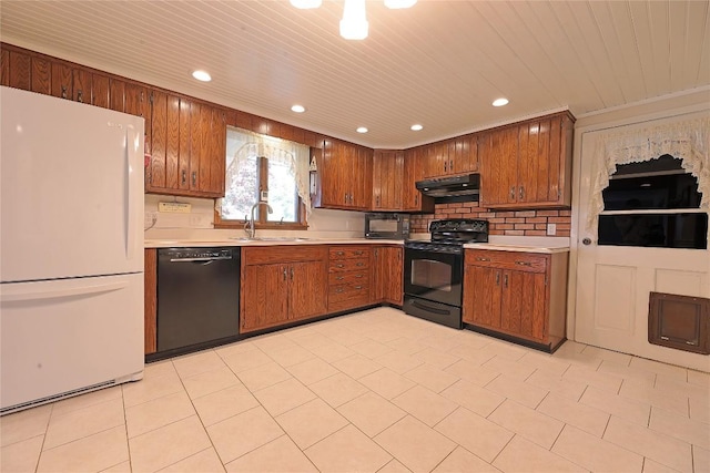 kitchen with crown molding, sink, and black appliances