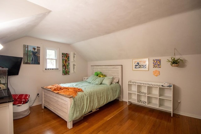 104 Hillcrest Dr, Edinboro, PA 16412 - bedroom featuring wood finished floors, baseboards, and vaulted ceiling