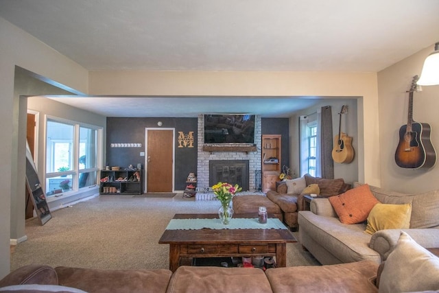 104 Hillcrest Dr, Edinboro, PA 16412 - carpeted living room with a fireplace