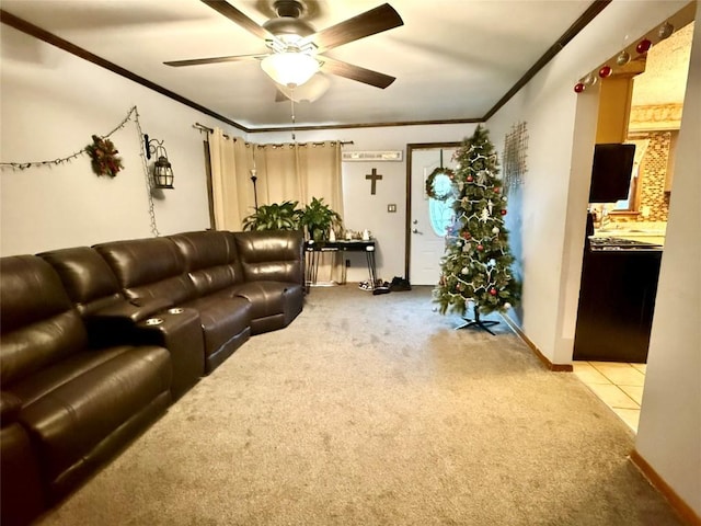 carpeted living room featuring ceiling fan and crown molding