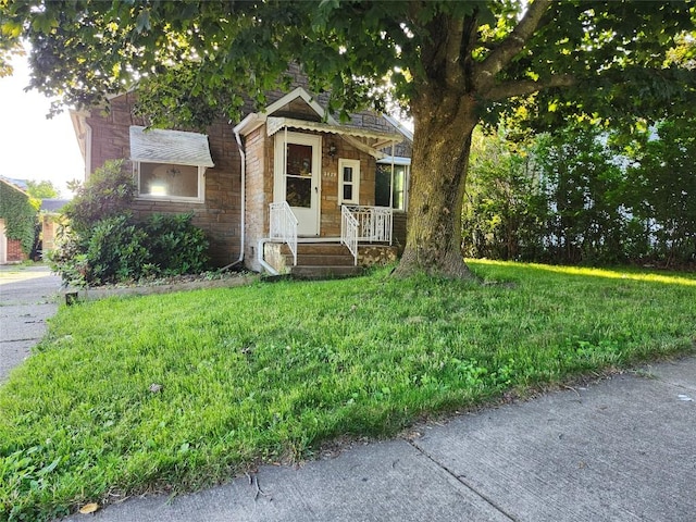 3829 Parade Blvd, Erie, PA 16504 - view of front of property with stone siding and a front yard