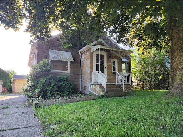 3829 Parade Blvd, Erie, PA 16504 - view of front of house featuring stone siding and a front lawn