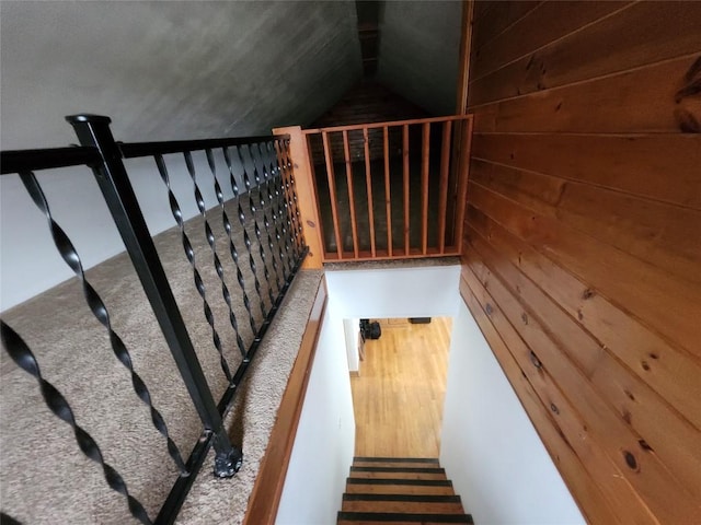 3829 Parade Blvd, Erie, PA 16504 - stairway featuring wooden walls and vaulted ceiling