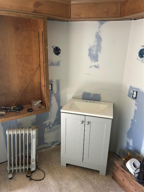 0 Hickory Dr, Espyville, PA 16424 - bathroom featuring tile patterned flooring, a sink, and radiator
