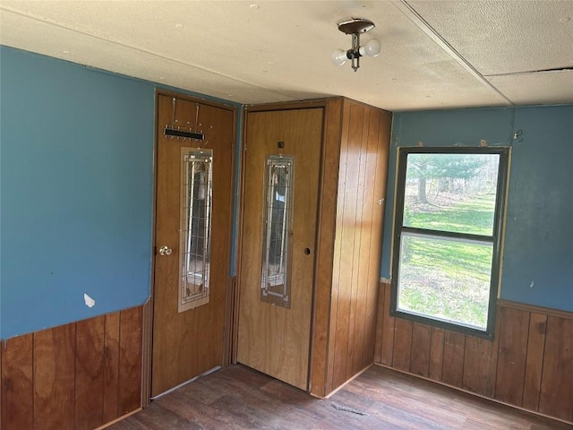 0 Hickory Dr, Espyville, PA 16424 - foyer entrance with wood walls, wood finished floors, and a wealth of natural light
