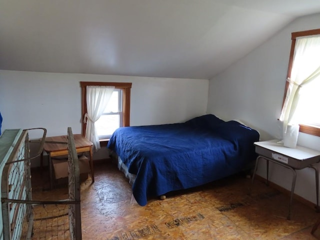 bedroom with vaulted ceiling