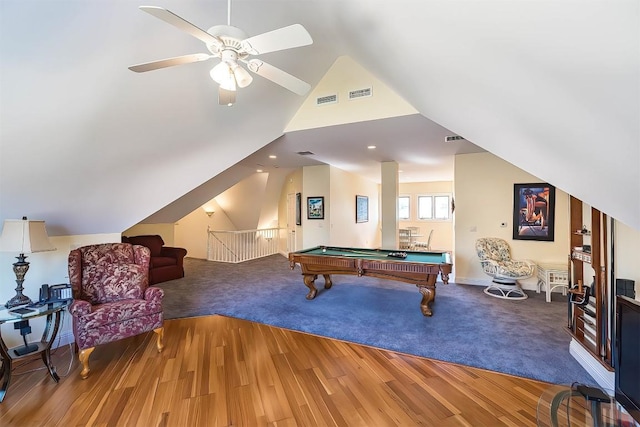 game room featuring billiards, visible vents, vaulted ceiling, and wood finished floors