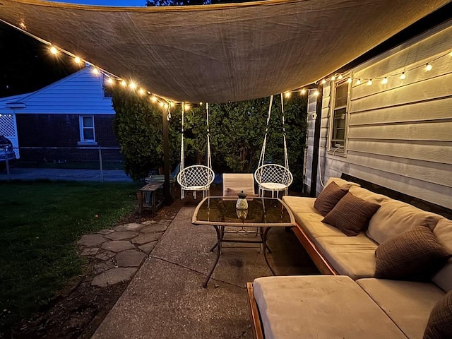 3322 Parade St, Erie, PA 16504 - patio at night with a patio area, outdoor lounge area, and a yard