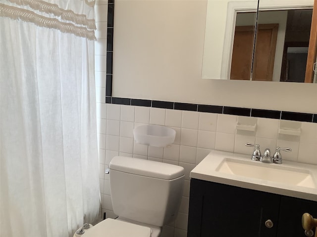 3322 Parade St, Erie, PA 16504 - full bathroom featuring vanity, tile walls, and curtained shower