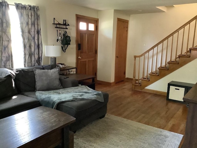 3322 Parade St, Erie, PA 16504 - living area featuring wood finished floors and stairway