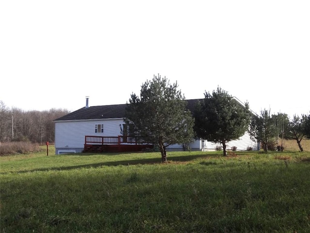 view of yard featuring a deck