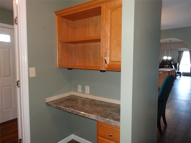 kitchen featuring dark wood-type flooring