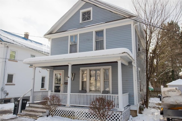 front of property featuring a porch