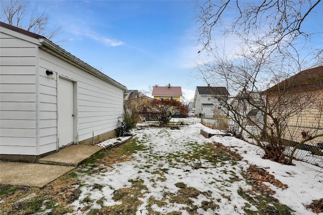 view of yard covered in snow