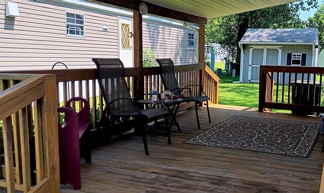 21 Ridgewood Dr, Erie, PA 16426 - wooden terrace featuring a storage unit and a yard