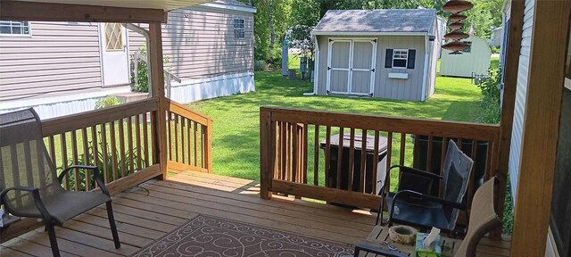 21 Ridgewood Dr, Erie, PA 16426 - wooden terrace featuring a storage unit and a lawn