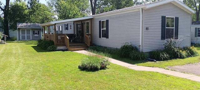 21 Ridgewood Dr, Erie, PA 16426 - manufactured / mobile home featuring a front lawn, a shed, and crawl space