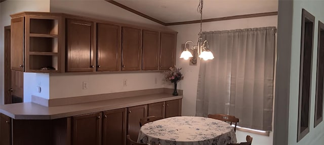 21 Ridgewood Dr, Erie, PA 16426 - kitchen featuring a chandelier, open shelves, light countertops, pendant lighting, and ornamental molding