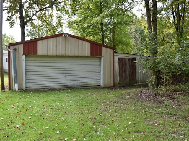 garage with a yard