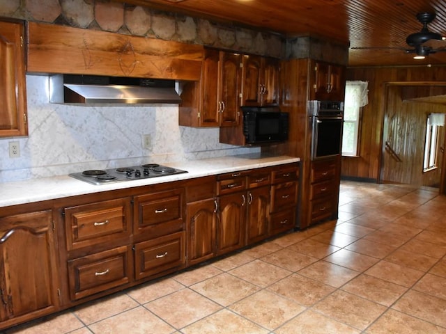 kitchen with decorative backsplash, wood ceiling, ceiling fan, black appliances, and light tile patterned flooring