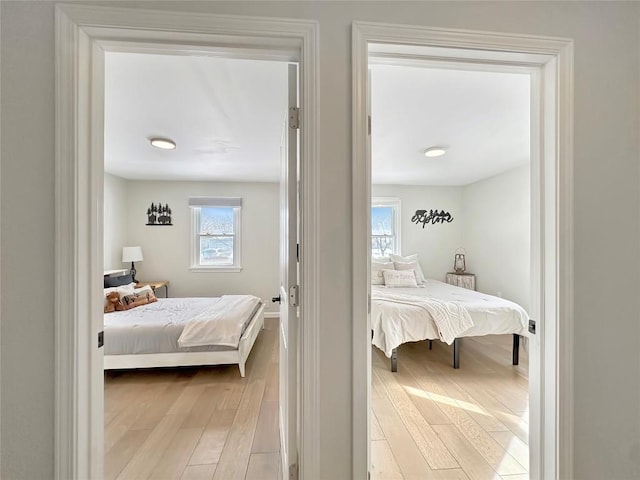 bedroom featuring light wood-style flooring