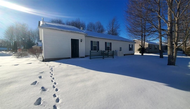 view of snow covered house