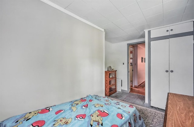 406 Spring St, Jamestown, PA 16134 - bedroom with wood finished floors, a closet, and baseboards