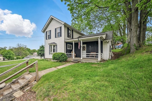 406 Spring St, Jamestown, PA 16134 - traditional home with covered porch and a front yard