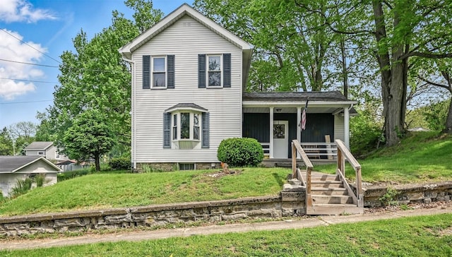 406 Spring St, Jamestown, PA 16134 - traditional home with covered porch and a front lawn