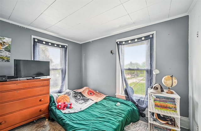 406 Spring St, Jamestown, PA 16134 - bedroom featuring ornamental molding and wood finished floors