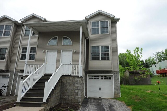 4140 Wood Hills Dr Unit C44, Erie, PA 16510 - multi unit property with a garage, a front lawn, and driveway