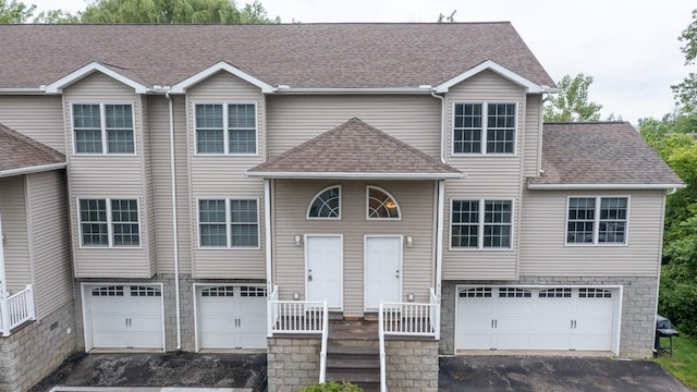 4140 Wood Hills Dr Unit C44, Erie, PA 16510 - view of front of home featuring a garage, a shingled roof, and asphalt driveway