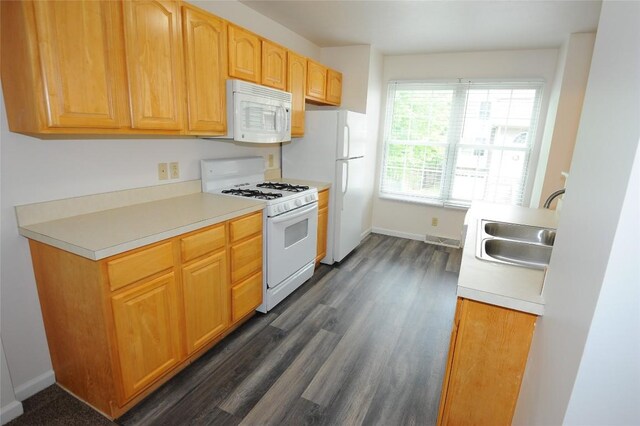 4140 Wood Hills Dr Unit C44, Erie, PA 16510 - kitchen with white appliances, a sink, dark wood finished floors, light countertops, and baseboards