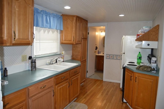 402 Main St, Saegertown, PA 16433 - kitchen featuring a sink, wallpapered walls, light wood-style floors, white range with electric cooktop, and brown cabinets
