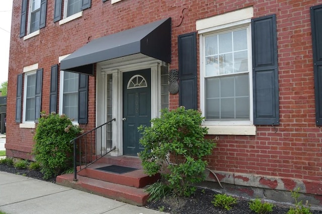 402 Main St, Saegertown, PA 16433 - entrance to property with brick siding