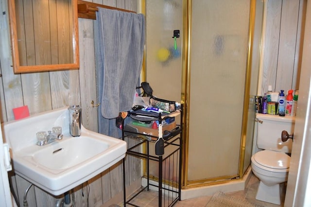 402 Main St, Saegertown, PA 16433 - bathroom with a shower stall, toilet, tile patterned floors, and a sink