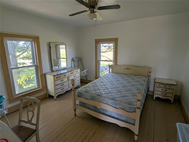 15916 Airport Rd, Linesville, PA 16424 - bedroom featuring wood-type flooring and a ceiling fan
