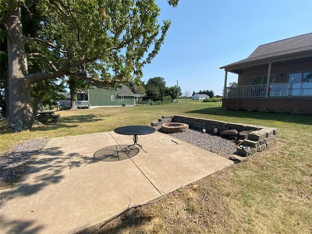 view of patio / terrace featuring a fire pit