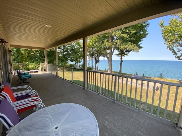 view of patio / terrace with a water view