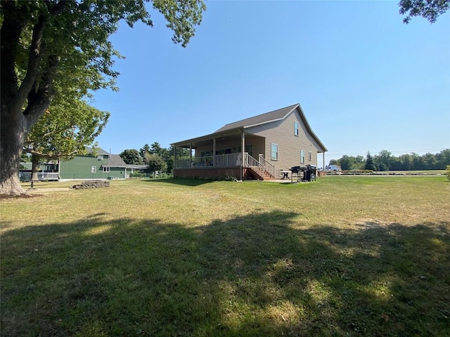 view of yard featuring a porch