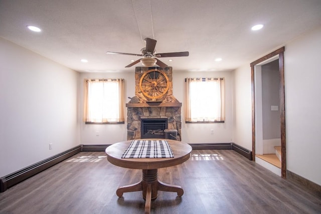 5499 Pinetree Rd, Mckean, PA 16426 - living area featuring wood finished floors, ceiling fan, a stone fireplace, recessed lighting, and healthy amount of natural light