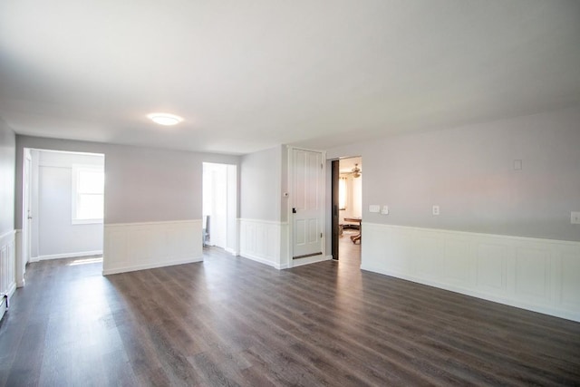 5499 Pinetree Rd, Mckean, PA 16426 - unfurnished room with wainscoting and dark wood-style floors