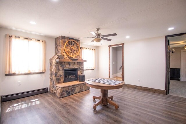 5499 Pinetree Rd, Mckean, PA 16426 - living area featuring a baseboard radiator, healthy amount of natural light, wood finished floors, a ceiling fan, and recessed lighting