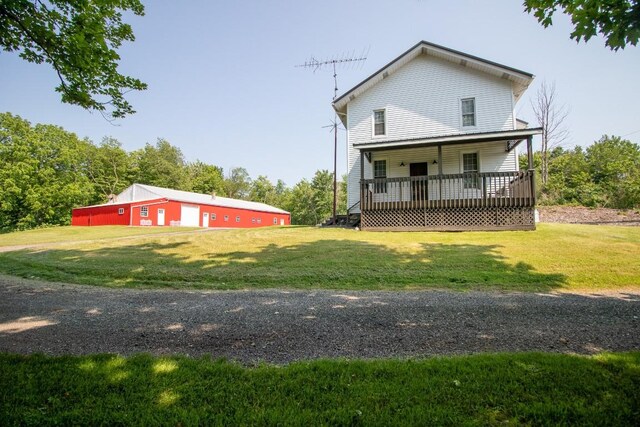 5499 Pinetree Rd, Mckean, PA 16426 - view of front of house featuring a front lawn and covered porch